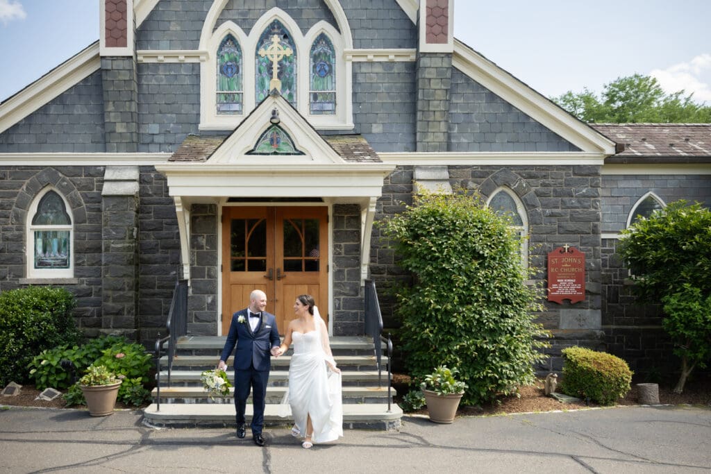 bride & groom outside St John Darien