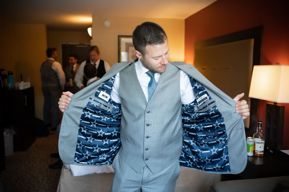 a groom getting ready for his wedding in chappaqua, ny