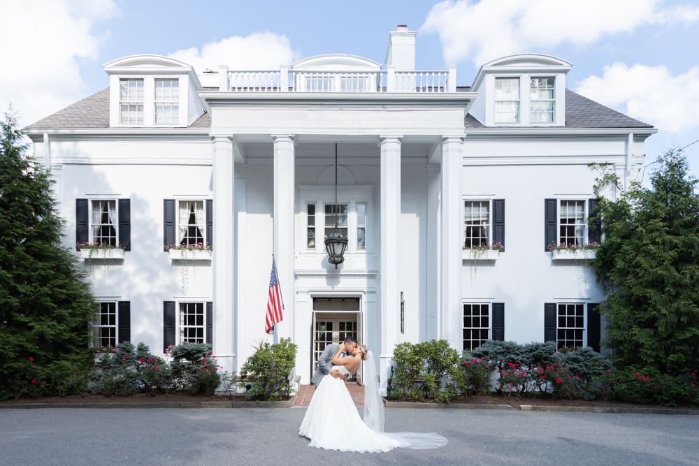 wedding portrait in front of crabtree's kittle house in chappaqua ny
