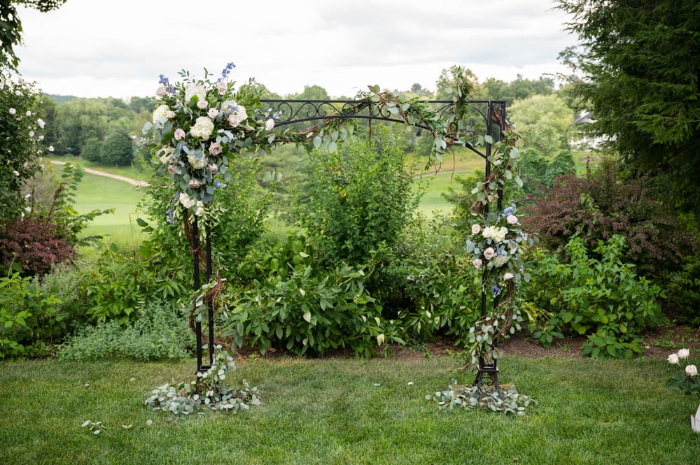 floral wedding arch at crabtree's kittle house in chappaqua ny